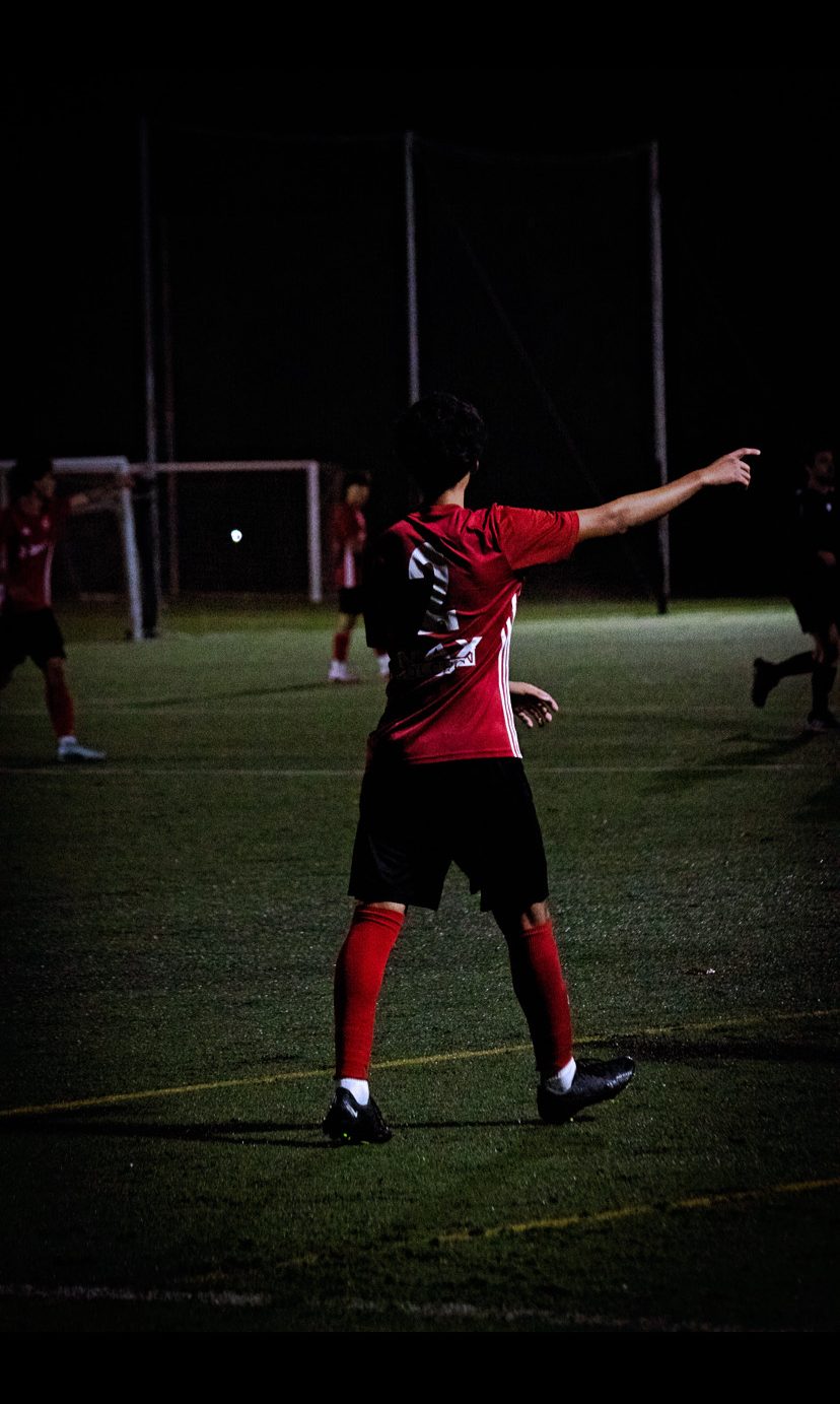 Coach Jay during a night match in Spain
